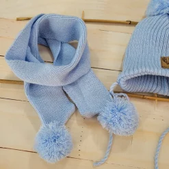 Komplet Czapka zimowa wiązana z pomponem + szalik z pomponami. Kolor błękitny