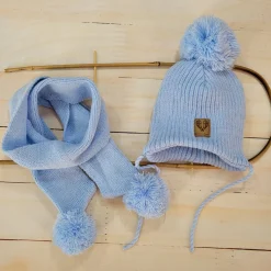 Komplet Czapka zimowa wiązana z pomponem + szalik z pomponami. Kolor błękitny