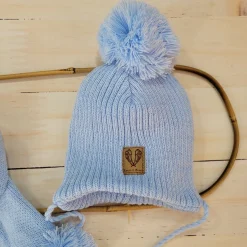 Komplet Czapka zimowa wiązana z pomponem + szalik z pomponami. Kolor błękitny