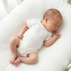 Prążkowane body rosnące wraz z dzieckiem 56-86 ecru krótki rękaw